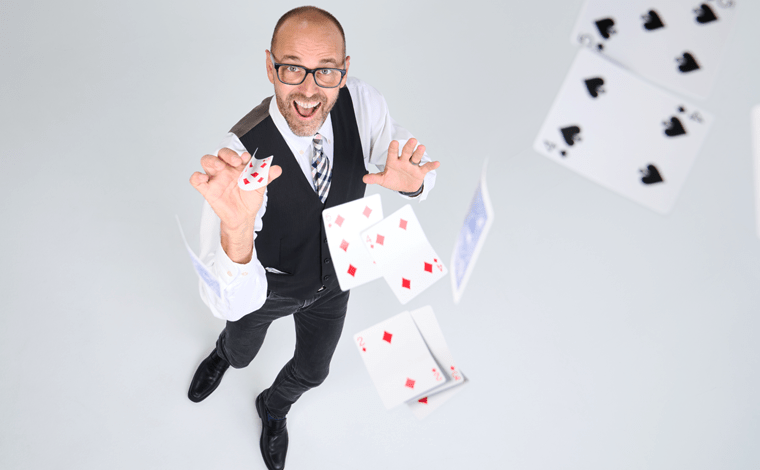 Christian the Magician doing a card trick. Live entertainers for your event!